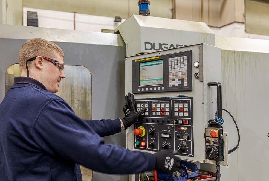 CNC programmer working in Sterling Thermal Technology's factory in the UK
