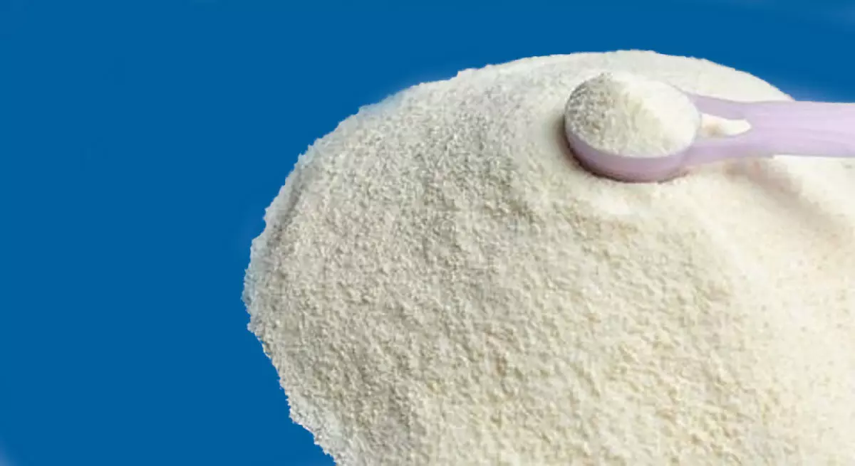 Photo of white milk powder on a table