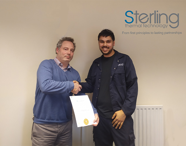 apprentice at Sterling Thermal Technology received a certificate from the production manager