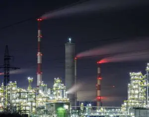 oil refinery by night