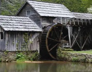 Hydropower, waterwheel that powers a flour mill